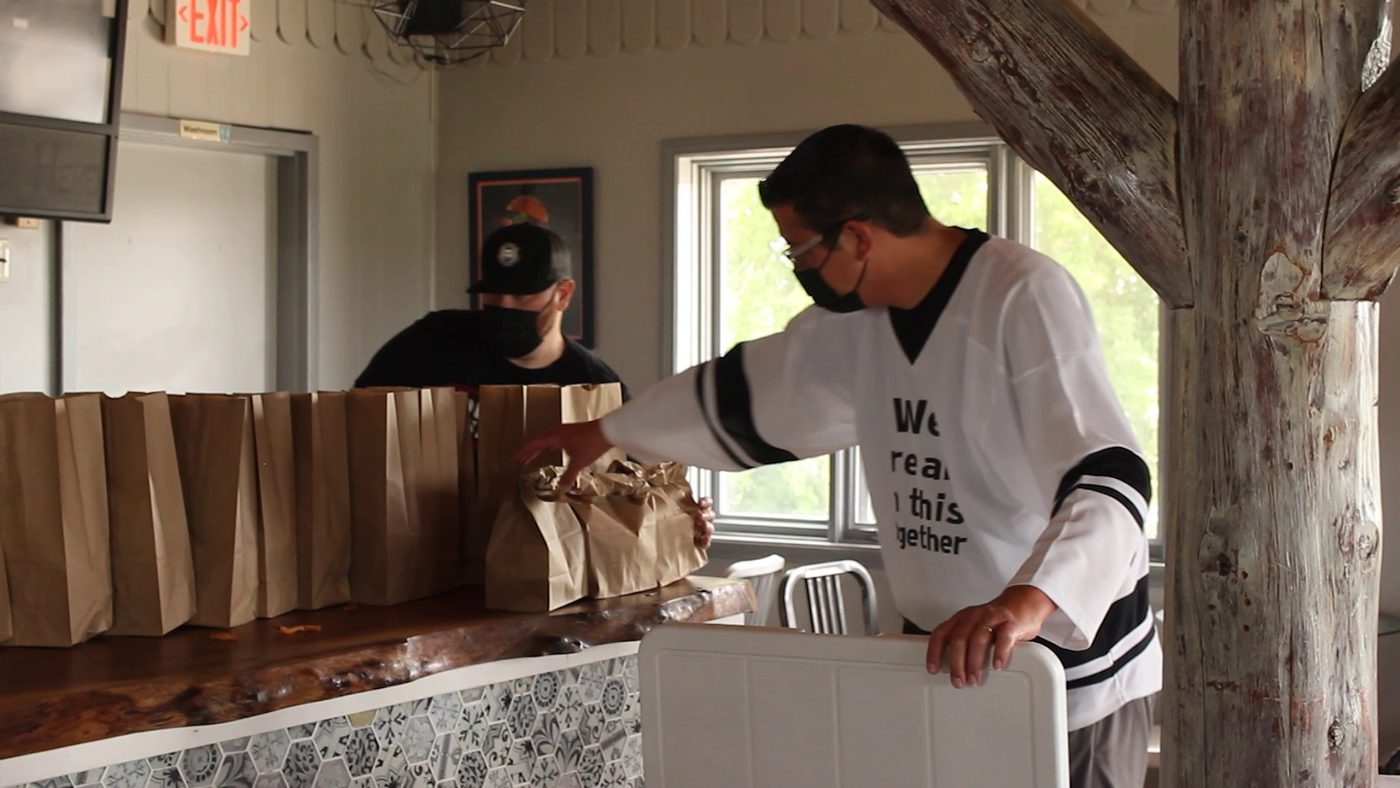 Travis Restoule volunteering during the pandemic meal program that raised funds for local restaurants